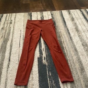 Fabletics orange leggings with pockets